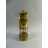 A Brass Miners Safety Lamp by Thomas and Williams Ltd