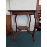 An Edwardian Mahogany Occasional Table with Stretcher Shelf,