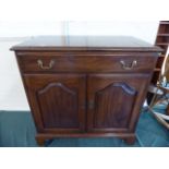 An American Mahogany Bar Cabinet with Fitted Long Drawer Over Fitted Cupboard Base, Lift Top Flaps,