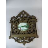 A Cast Metal Wall Hanging Stationery Rack Decorated with Cartouche Depicting Figures by Pond,