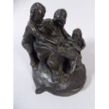 A Lead Filled Bronze Figural Study of Sleeping Grandfather Being Teased by Children with Toad
