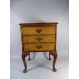 A Good Quality Dillon Three Drawer Bedside Chest in Burr Walnut with Cabriole Legs,