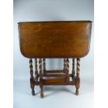 An Oak Drop Leaf Barley Twist Gate Legged Table,