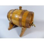 A Copper Banded Oak Spirit Barrel with Brass Tap,