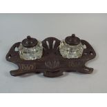 A Metal Art Nouveau Style Desk Top Ink Stand with Two Glass Bottles,