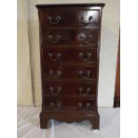 A Small Narrow Mahogany Chest of Six Long Drawers on Bracket Feet,