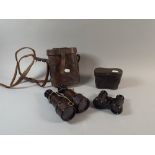 A Late 19th/Early 20th Century Leather Cased French Binoculars by Lemare Together with a Small Pair