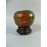 An Early 20th Century Japanese Ginger Jar with Red and Green Enamelled Decoration and on Hardwood
