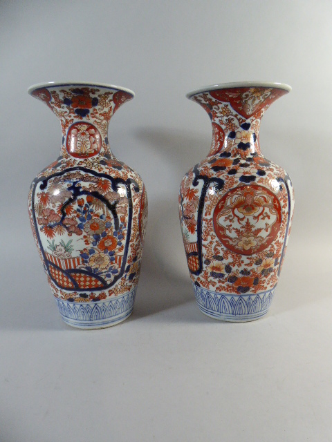 A Pair of Oriental Vases Decorated in Usual Imari Enamels.