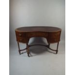 A Walnut Kidney Shaped Ladies Writing Desk Having Centre Drawer Flanked by Two Smaller Drawers