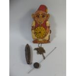 A Mid 20th Century Novelty Wall Clock in the Form of a Monkey with Moving Eyes.