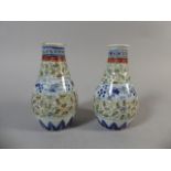 A Pair of Small Oriental Vases Decorated in Multicoloured Enamels with Red Seal Mark to Base.