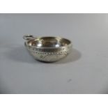 An Early Continental Silver Wine Taster with Ring Handle .