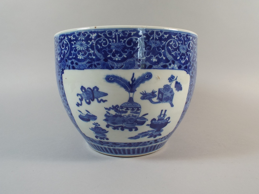 A Nicely Decorated Blue and White Oriental Planter or Fish Bowl with Panels Depicting Antiques,