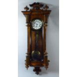 A Late 19th Century Walnut Single Weight Vienna Wall Clock with Ebonised Half Pilasters and White