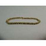 A Pretty 9ct Gold and Oval Cut Peridot Bracelet. 36 Stones. 19cm Long. 8.4gms.