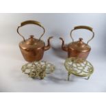 A Near Pair of Victorian Copper Kettles (Largest 34cm High) Together with Two Victorian Brass