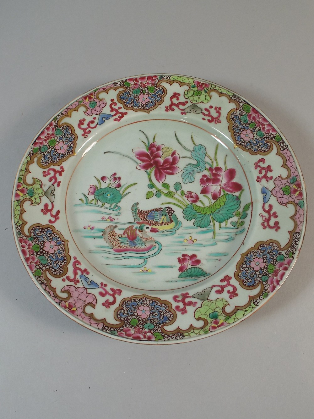 An Early Chinese Famille Rose Plate depicting Ducks in Polychrome Enamel and with Gilt Highlights