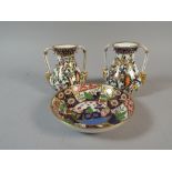 A Near Pair of Crown Derby Two Handled Vases decorated with Birds in Tree,