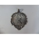 A Restruck 1780 Maria Theresa Coin Framed as Pendant