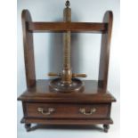 A 19th Century Book Press Made of Mixed Woods with a Rise and Fall Screw Mechanism over a Single