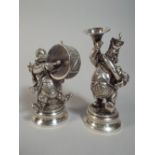 A Pair of Spanish Silver Figures of Rotund Caricature Bandsmen. Stamped PLATA to Base.