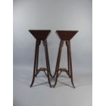 A Pair of Late 19th Century Oak Arts and Crafts Torcheres.