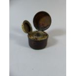 An Edwardian Leather Covered Travelling Ink Well. 6cm Diameter.