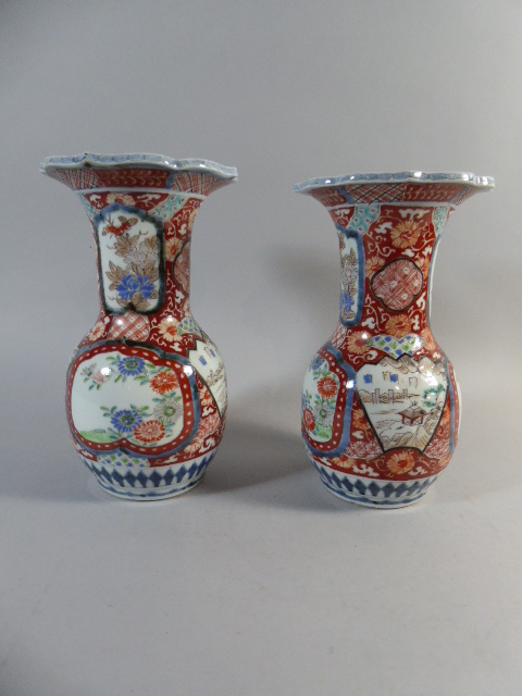 A Pair of Oriental Imari Patterned Vases. 24.