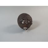 A 19th Century White Metal Mounted Bugbear Powder Flask. Carved From a Coconut Shell.