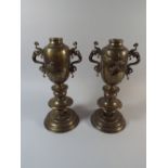 A Pair of Heavy Silver Mounted Bronze Oriental Urns.