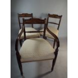 A Set of Six Regency Mahogany Dining Chairs with Star Inlay to Top Rail to include One Carver