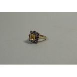 A Pretty 9ct Yellow Gold Amethyst and Citrine Ring. Size N. 4.