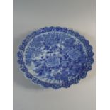 A 19th Century Oriental Blue and White Scalloped Plaque Decorated with Chrysanthemums,