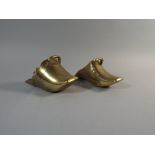 A Near Pair of Eastern Brass Stirrups Decorated with Etched Banding and Lotus Flower.