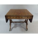 A 19th Century Drop Leaf Mahogany Sofa Table with Two Drawers,