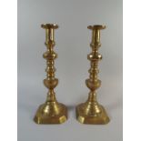 A Pair of Large Vctorian Brass Candlesticks with Turned and Stepped Feet and Stems.