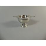 A Silver Tea Strainer on Stand, Birmingham 1936, 71.