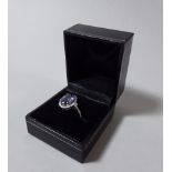 A White Gold and Diamond Ring Set with an Oval Cut Tanzanite Approx. 3.67ct. Diamonds Approx.