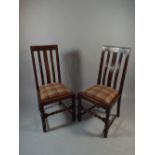 A Set of Six Oak Framed Dining Chairs with Tartan Upholstered Pad Seats and Barley Twist Front