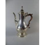 A George III Silver Coffee Pot by Charles White,