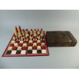 A Carved Wooden Chess Box Containing Complete Set of 19th Century Ivory Chess and Draughts Pieces