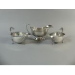 A Pair of Silver Plated Sauce Boats by Mappin and Webb together with a Larger Example,