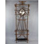 A 19th Century Bamboo Hall Stand with a High Back Decorated with Steam Bent Bamboo and a Bevelled