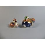 A Royal Crown Derby Paperweight, Mandarin Duck, Gold Button together with Swimming Duckling,