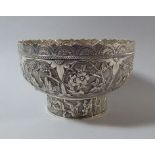 A Good Chinese Silver Embossed Bowl Decorated in Relief with Figures,
