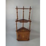 An Inlaid Rosewood Three Tier Whatnot with Cupboard Base