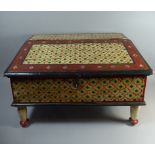 A 19th Century Indian Writing Slope with Two Interior Drawers and Supported on Turned Feet.