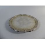 A Silver Card Tray on Three Scrolled Feet. London 1940. 20cm Diameter. 385gms.