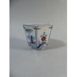 A Small Chinese Hexagonal Vase Decorated in Coloured Enamels but Mainly Blue and White. 7cm High.